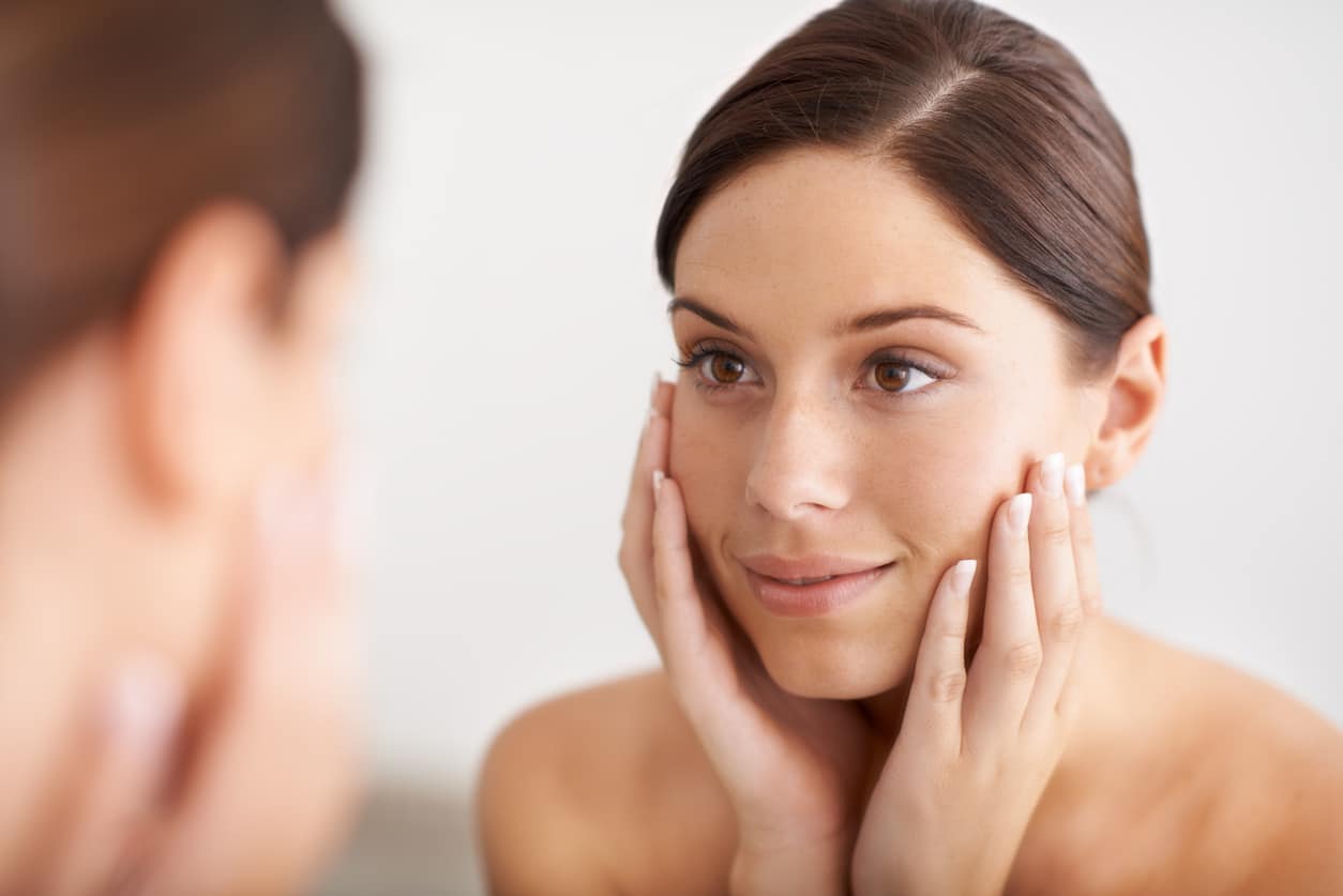 Woman with glowing skin after a chemical peel